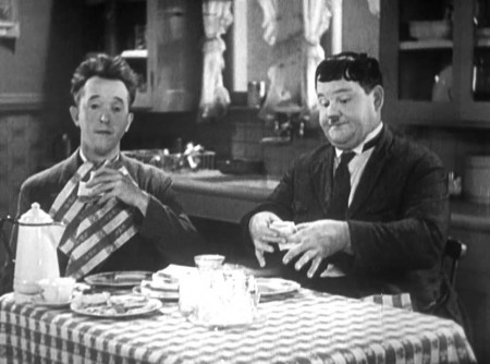 laurel-and-hardy-eating-in-one